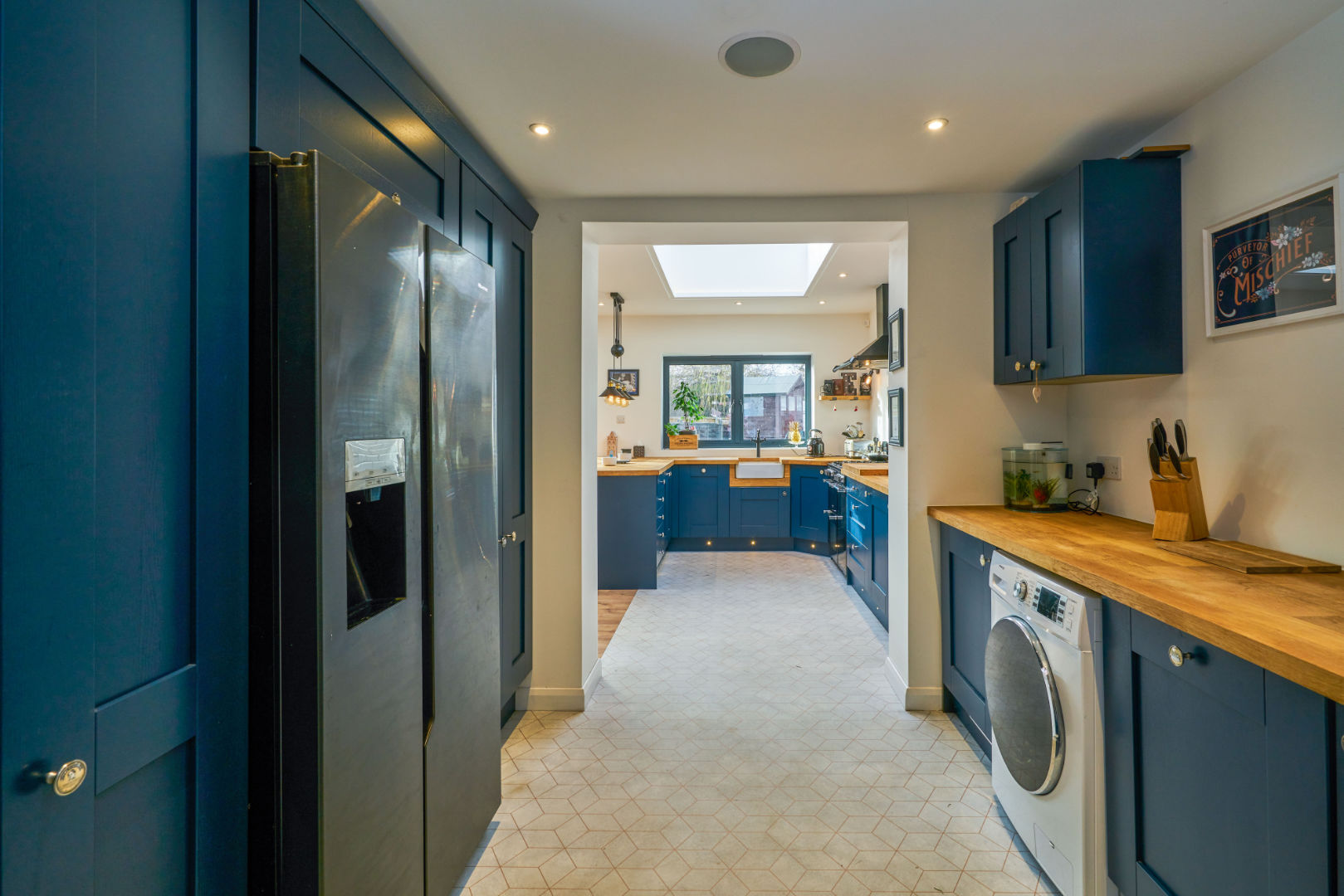 A photo of a blue kitchen.